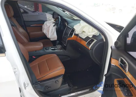 2013 Jeep Grand Cherokee Overland z USA, uszkodzony, nr VIN 1C4RJFCT5DC642313